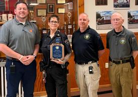 EMS Council members presenting EMS Supervisor Luann Thomas the Medal of Valor